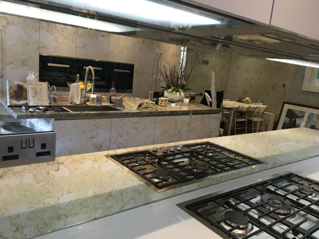 Mirror glass splashback in Kensington luxury kitchen